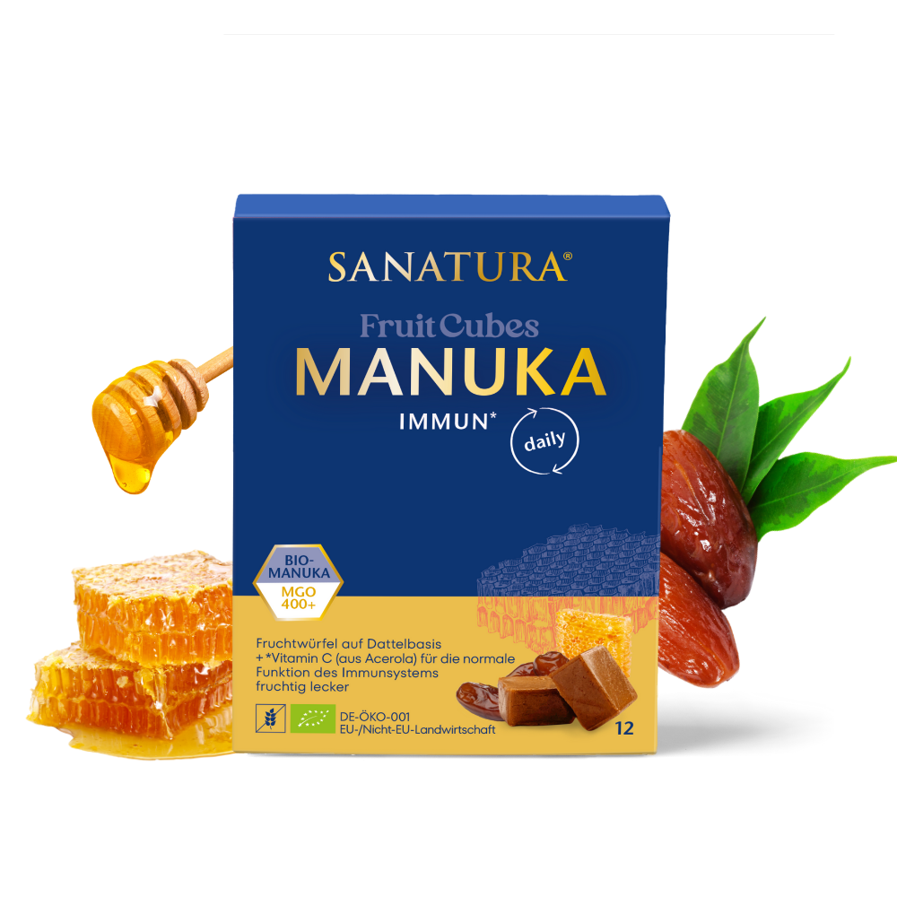 Fruit Cubes Manuka Verpackung neben Datteln und Honigwaben